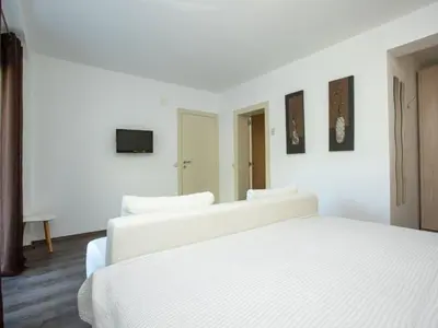 Krevet ili kreveti u jedinici u objektu Apartment Appartement in Duće mit Großem Balkon by Interhome