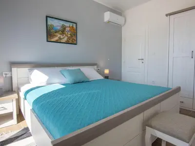 Krevet ili kreveti u jedinici u objektu Holiday Home in Pučišća mit Privatem Pool by Interhome