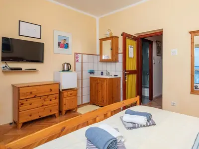 Krevet ili kreveti u jedinici u objektu Holiday Home Mer Vue - Haus am Meer by Interhome
