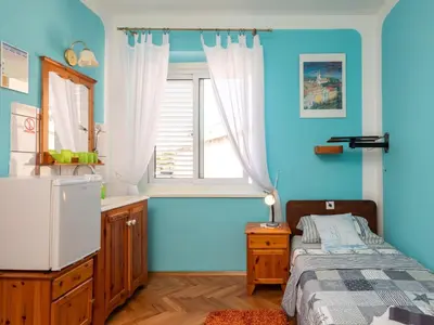 Krevet ili kreveti u jedinici u objektu Holiday Home Mer Vue - Haus am Meer by Interhome