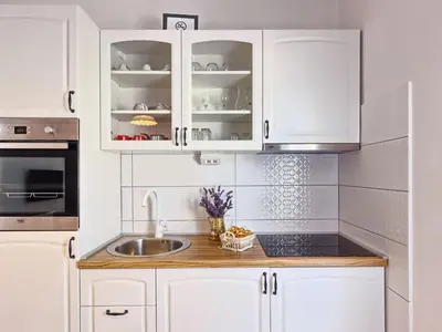 Kuhinja ili čajna kuhinja u objektu Apartment Gemütliches Studio mit Balkon by Interhome