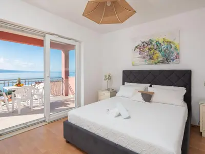 Krevet ili kreveti u jedinici u objektu Holiday Home für 12 Personen in Stanići- Dalmatien - Mitteldal by Interhome