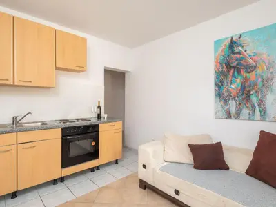 Kuhinja ili čajna kuhinja u objektu Holiday Home für 12 Personen in Stanići- Dalmatien - Mitteldal by Interhome