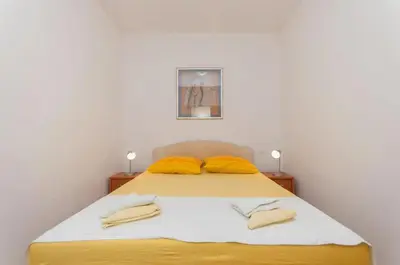 Krevet ili kreveti u jedinici u objektu Apartments Pine and Sea