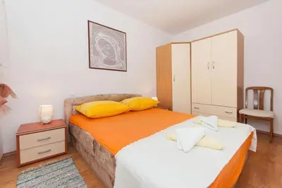 Krevet ili kreveti u jedinici u objektu Apartments Pine and Sea