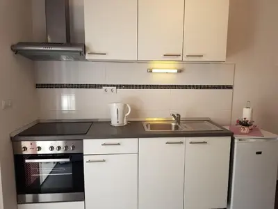 Kuhinja ili čajna kuhinja u objektu Apartments Antonia