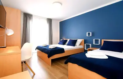 Krevet ili kreveti u jedinici u objektu Villa Victoris Beachfront Luxury Villa with Heated Spa Pool Podstrana