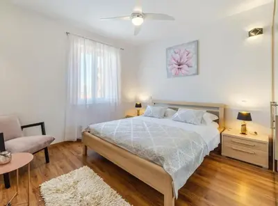 Krevet ili kreveti u jedinici u objektu Sutivan Sea Terrace Apartment