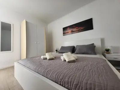 Krevet ili kreveti u jedinici u objektu Apartments Sun&Sea