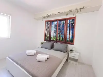 Krevet ili kreveti u jedinici u objektu Apartments Sun&Sea