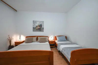 Krevet ili kreveti u jedinici u objektu Sobe Lončar