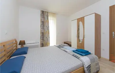 Krevet ili kreveti u jedinici u objektu 2 Bedroom Beautiful Apartment In Brela