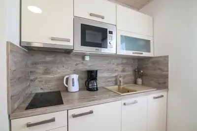 Kuhinja ili čajna kuhinja u objektu Helvetia Sunny Apartments - Free Private Parking