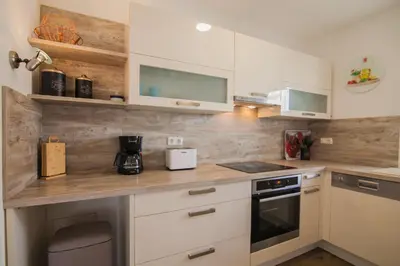 Kuhinja ili čajna kuhinja u objektu Helvetia Sunny Apartments - Free Private Parking