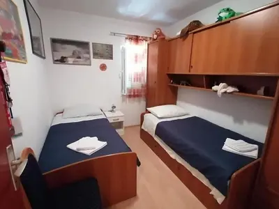 Krevet ili kreveti u jedinici u objektu Apartments by the sea Postira, Brac - 25147