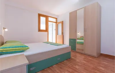 Krevet ili kreveti u jedinici u objektu Holiday Apartment Krvavica 08