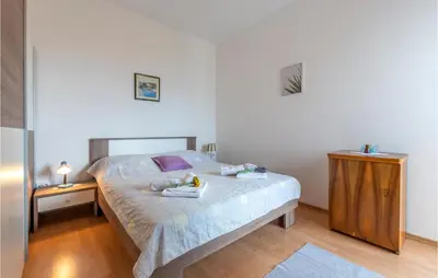 Krevet ili kreveti u jedinici u objektu Holiday Apartment Suhi Potok 07