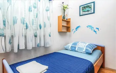 Krevet ili kreveti u jedinici u objektu Holiday Apartment Omis 07