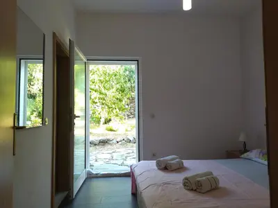 Krevet ili kreveti u jedinici u objektu Holiday Home with free parking by the beach