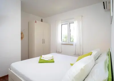 Krevet ili kreveti u jedinici u objektu Guest House Milan