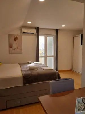 Krevet ili kreveti u jedinici u objektu Apartments Rose Loboja