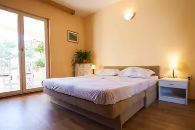 Krevet ili kreveti u jedinici u objektu Apartments Radić