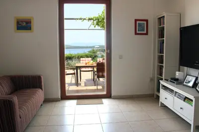 TV i/ili zabavni centar u objektu Apartments Giardino