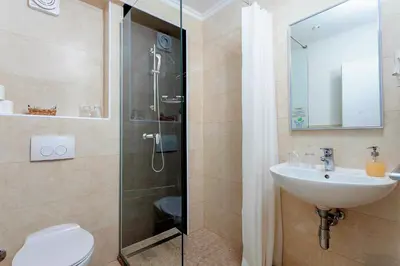 Kupaonica u objektu Sunset Split Rooms