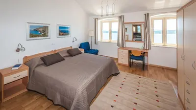 Krevet ili kreveti u jedinici u objektu Nautilus-Bay Steinhaus im Dorf von Zavala für 2-7 Personen, 3 Schlafzimmer