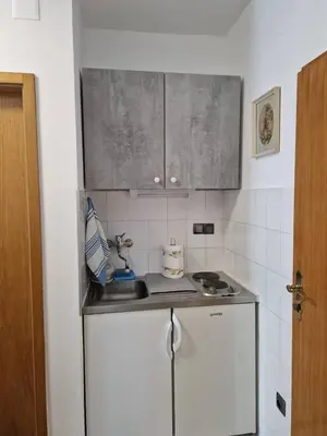 Kuhinja ili čajna kuhinja u objektu Apartments by the sea Omis - 771