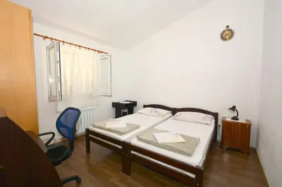 Krevet ili kreveti u jedinici u objektu Apartments by the sea Suhi Potok, Omis - 11401