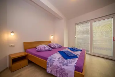 Krevet ili kreveti u jedinici u objektu Apartments Emil