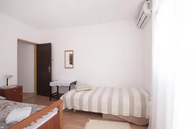 Krevet ili kreveti u jedinici u objektu Apartments Mira