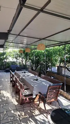 Restoran ili neka druga zalogajnica u objektu Holiday Home Leonida
