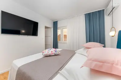 Krevet ili kreveti u jedinici u objektu Seaview Apartments Nives