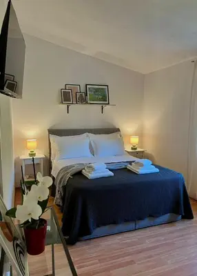 Krevet ili kreveti u jedinici u objektu Apartments Curnić