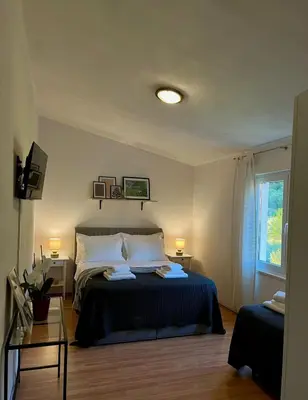 Krevet ili kreveti u jedinici u objektu Apartments Curnić