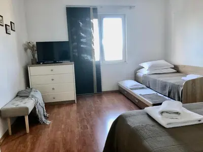 Krevet ili kreveti u jedinici u objektu Apartments Curnić