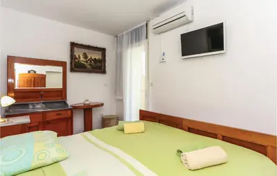 Krevet ili kreveti u jedinici u objektu Apartment Omis With Sea View 03