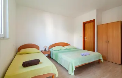 Krevet ili kreveti u jedinici u objektu Apartment Stanici With Sea View 11
