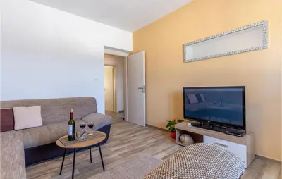 TV i/ili zabavni centar u objektu Apartment Podstrana With Sea View 10