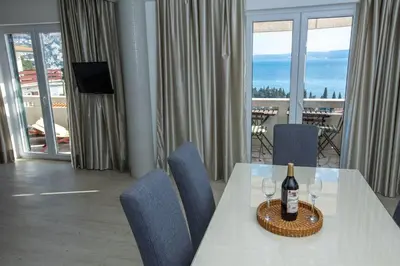 TV i/ili zabavni centar u objektu Apartments Mosor