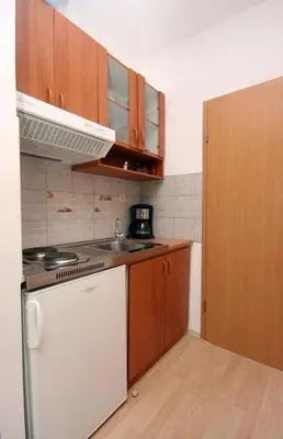 Kuhinja ili čajna kuhinja u objektu Apartments with a parking space Duce, Omis - 4799