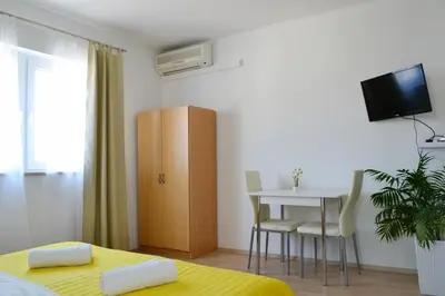 TV i/ili zabavni centar u objektu Apartments with a parking space Duce, Omis - 4799