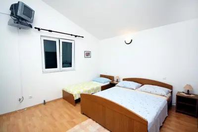 Krevet ili kreveti u jedinici u objektu Apartments by the sea Balica Rat, Omis - 4868