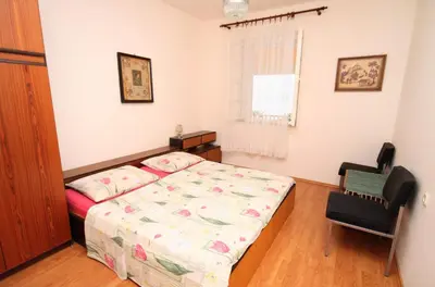 Krevet ili kreveti u jedinici u objektu Apartments by the sea Pisak, Omis - 1070