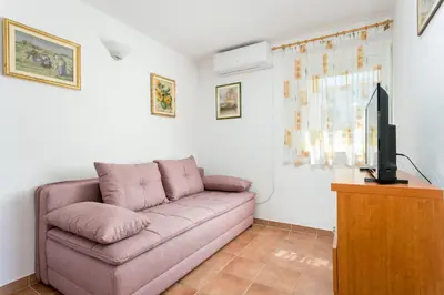 TV i/ili zabavni centar u objektu Apartments by the sea Baska Voda, Makarska - 300