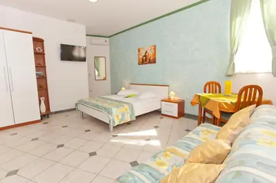 Krevet ili kreveti u jedinici u objektu Apartments and rooms by the sea Brela, Makarska - 6056