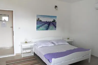 Krevet ili kreveti u jedinici u objektu Apartments by the sea Mimice, Omis - 656