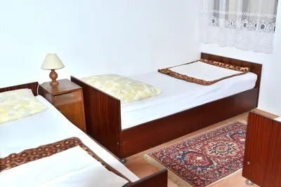 Krevet ili kreveti u jedinici u objektu Apartments by the sea Pisak, Omis - 658